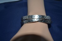 Trio de bracelets liés en métal plein avec étoiles.